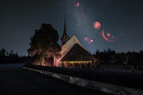 Orion and Milky Way over a church located in the Berner Oberland area of Switzerland